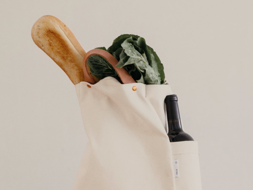 Market bag and fresh groceries brought into a home